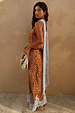 Brown Fawn Midi Maeva Skirt featuring a white spotted print and a light blue lace border at the hem.