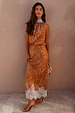 Fawn Midi Maeva Skirt with a brown spotted print and delicate white lace border, shown on a model.