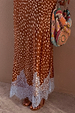 Fawn Midi Maeva Skirt featuring a brown fawn print and delicate lace trim, styled with a colourful beaded bag.