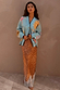 Fawn print Maeva midi skirt with a brown base and white lace trim, styled with a light blue graphic cardigan.