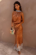 Fawn print Midi Maeva Skirt and matching halter top with a lace trim and beaded bag.