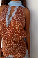 Brown and white Fawn Lily Top featuring a deep V-neckline, blue lace trim and multi-wear tie details.