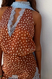 Brown and white Fawn Lily Top featuring a deep V-neckline, blue lace trim and multi-wear tie details.