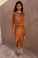 Multi-wear Fawn Lily Top and matching Maeva maxi skirt co-ord in a brown fawn print with blue tie neck detail.