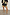 Thumbnail for Fiji Elissa Shorts featuring a multi-coloured print and orange rick rack trim, styled with a black graphic tee.