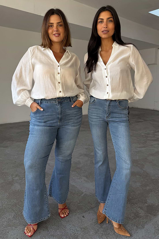 Blue Denim Flare Scallop Jeans with a 70s silhouette, shown on two models for inclusive sizing.