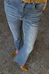 Thumbnail for Blue Denim Flare Scallop Jean with a 70s-style flared leg, scallop pockets and faded wash finish.