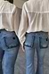 Thumbnail for Blue Denim Flare Scallop Jean with scalloped back pockets, shown on models in UK sizes 8 and 18 for inclusive sizing.