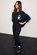 Black Cotton Wide Leg flares with ecru embroidery and matching sweatshirt, styled as a casual co-ord.