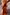 Thumbnail for Burnt orange Blurred Floral Sofia Dress highlighting the fluid bias-cut drape and side slit.