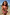 Thumbnail for Girls Pink Fruit Crop Bikini Set with a Mediterranean fruit print, shirred bandeau top and frill bottoms at the beach.