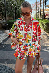 Fruit Stamps Co-ord Set with a vibrant Mediterranean fruit print, including an oversized shirt and tiered frill shorts.