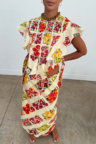 Fruit Stamps Florence Top in cream cotton linen with a Mediterranean fruit print and asymmetric ruffles.