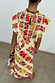 Fruit Stamps Florence Top in cream cotton-linen featuring a Mediterranean print and layered back ruffles.