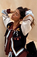 Geometric Knit Cardigan with palm motif embroidery, blanket stitch trim and a collared neck in autumnal tones.