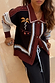 Geometric Knit Cardigan featuring iconic embroidered palm motifs and blanket stitch trim in autumnal tones.