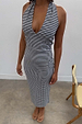 Black and white Gingham Halterneck Dress featuring a plunging V-neckline and retro chequered print in a midi length.