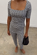 Black and white Gingham Top featuring a deep square neckline and corset-style darts, styled as a co-ord.