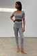 Black and white Gingham Trousers and matching top co-ord set featuring a skinny fit and square neckline.