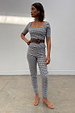 Black and white Gingham Trousers and matching top co-ord set featuring a skinny fit and square neckline.