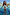 Thumbnail for Blue Starburst Crop Bikini Set with a smocked top and frill trims, worn by a girl in a sunny vacation pool.