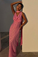 Pink Sophie Dress with shimmering gold flecks and a cowl neck, styled with a matching scarf on a model in sunlight.