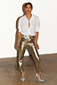 Thumbnail for Metallic Gold Vegan Leather Trousers styled with a white button-down shirt and light blue heels.