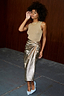 Thumbnail for Gold Vegan Leather Jaspre wrap midi skirt styled with a sleeveless gold top and blue heels.
