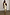Thumbnail for Gold Metallic Ribbed midi dress with a sleeveless design and side slit, styled with slouchy boots.