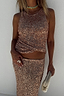 Thumbnail for Gold Sequin Tank Top and matching sequin skirt styled with layered beaded necklaces.
