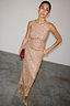 Thumbnail for Gold Sequin Tank Top styled with a matching sequin maxi skirt and a red clutch bag.