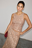 Thumbnail for Gold Sequin Tank Top and matching sequin skirt styled with a red clutch bag.