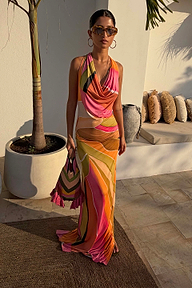 Green Abstract Sabine Maxi Dress featuring a multicoloured swirl print and cowl neckline, styled for a summer vacation.