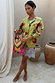 Thumbnail for Green Enchanted Cardigan with NFD motifs and a multi-coloured ribbed trim, styled with a lace skirt.