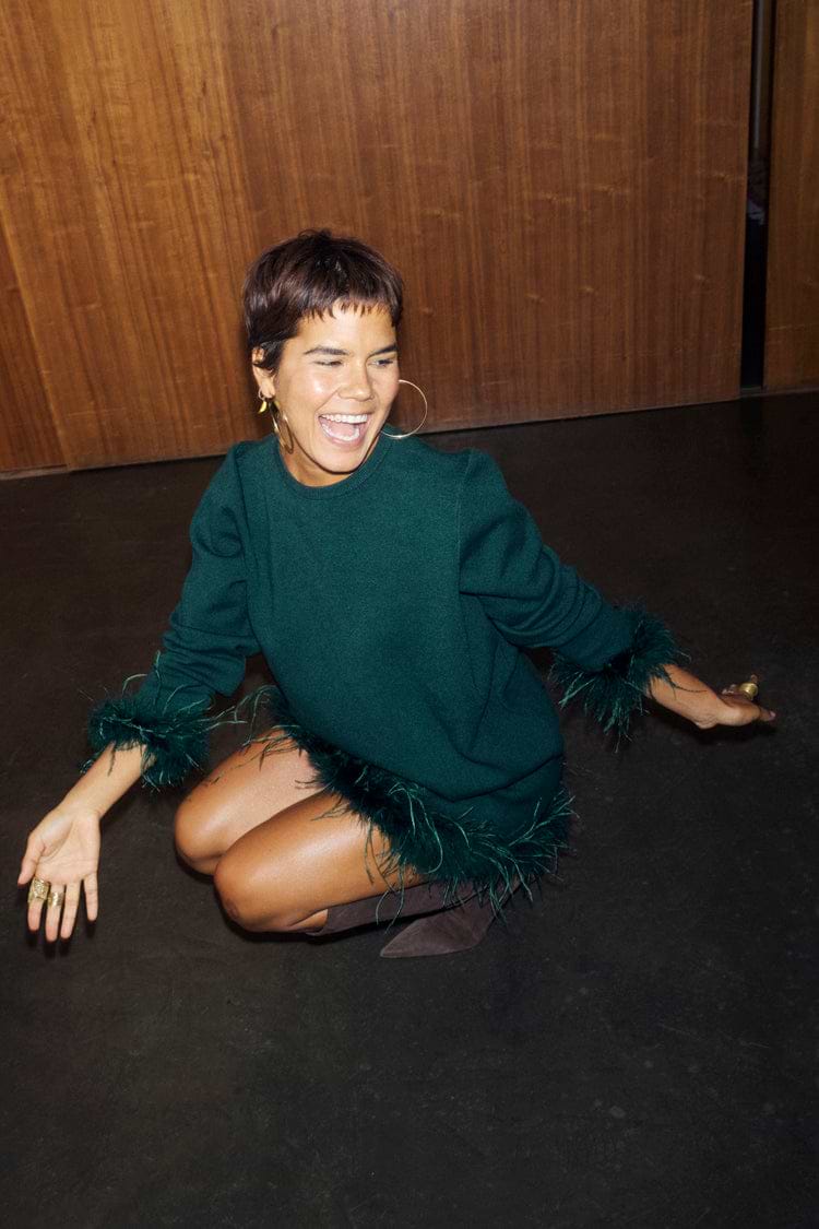 Bottle Green Jamie Jumper featuring detachable feather trims on the cuffs and hem in a soft knit finish.