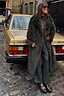 Thumbnail for Green Faux Fur Coat with a relaxed fit, styled for a street style London look by a vintage car.