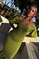 Olive Jojo Dress with gold fleck print, shirred bodice and off-the-shoulder puff sleeves.