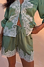 Thumbnail for Green Lace Maeva Shorts in satin with white lace edging and a functional drawstring waist.