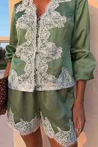 Green Lace Maeva Shorts and matching satin shirt with intricate white lace trim and button details.