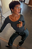 Thumbnail for Dark green long sleeve Teddy T-shirt with mesh neckline detail and studded leather trousers.