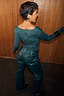 Thumbnail for Green Long Sleeve Teddy T-Shirt with a mesh neckline and back logo, paired with studded green leather-look trousers.