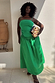 Green Lola Mid-axi Dress with ruched side seams and a breathable cotton skirt.