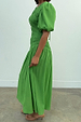 Green Shirred Nara Dress featuring a shirred bodice, puff sleeves and a pleated midaxi skirt.