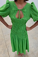 Green Shirred Nara Dress featuring a multi-wear tie neck, puff sleeves, and an elasticated smocked bodice.