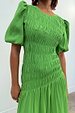 Green Shirred Nara Dress with a shirred bodice and puff sleeves for multi-wear styling.