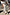 Thumbnail for Grey Jesse Jersey Wrap Dress with a multi-wear tie waist, styled with trainers and a silver bag for a London look.