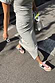 Grey marl Jesse Jersey Wrap Dress with a multi-wear tie, styled with colourful trainers for a casual street style look.