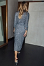Gunmetal Sequin Jaspre Midi Skirt and matching long-sleeved top seen from behind on a walking model.