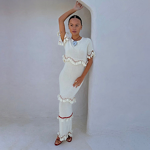 Ivory and Red Harper midaxi dress in cream cotton knit with red crochet scallops and tassel details.