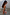 Thumbnail for Hexagon Orange Sunglasses with light-tinted lenses, styled with a colourful strapless top for a vacation look.